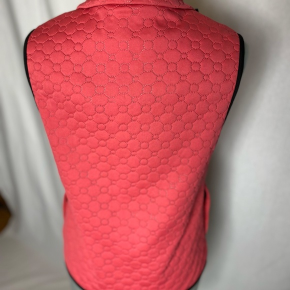 Swing Golf Vest in coral. - Picture 7 of 11
